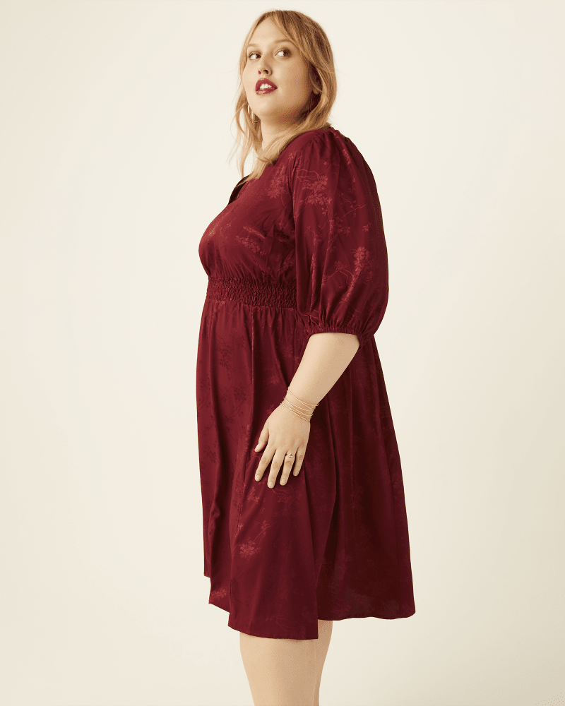 Back of plus size Clara Ruched-Waist Midi Dress by Sandra Darren | Dia&Co | dia_product_style_image_id:171225